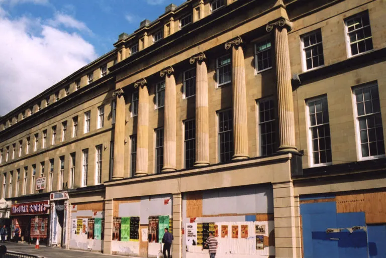Newcastle's Grainger Street, with several empty retail units.