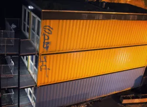Shipping containers in Brighton used to house homeless households (courtesy of VICE)
