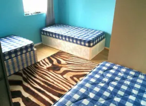 Three single beds in a room to rent with two other people in Camden