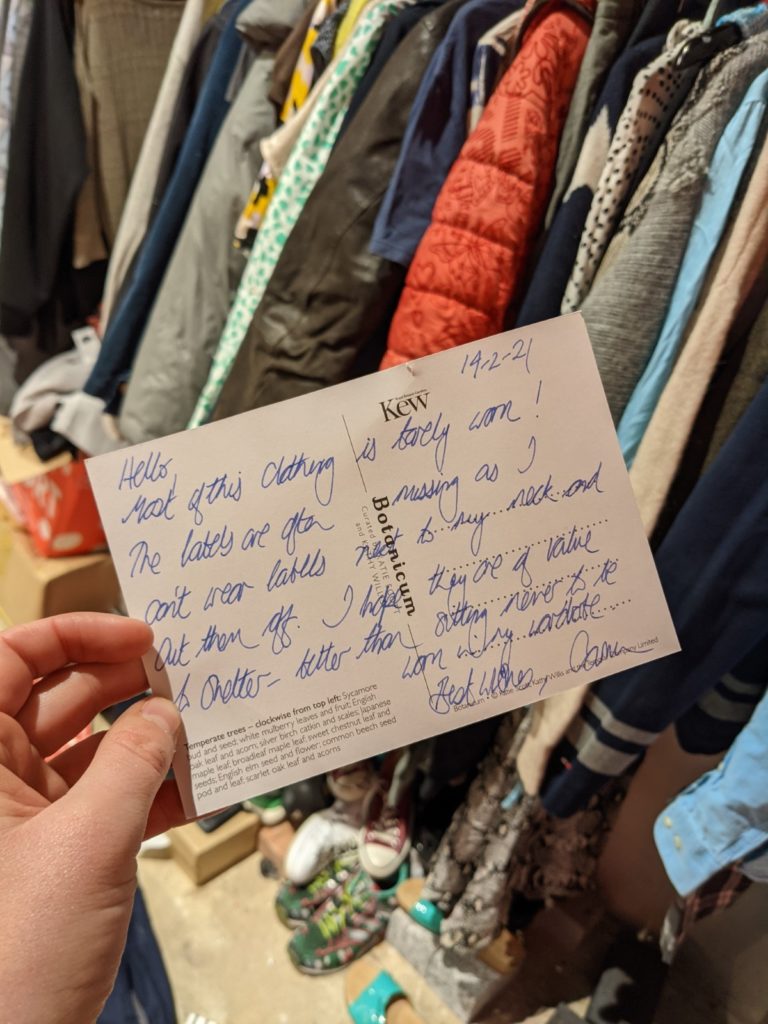 A handwritten note from a parcel we received, which reads 'Most of this clothing is barely worn... I hope they are of value to Shelter. Better than sitting never to be worn in my wardrobe.'