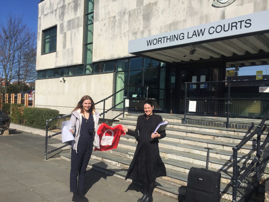 Hayley and her Shelter solicitor, Rose, smiling and standing outside court